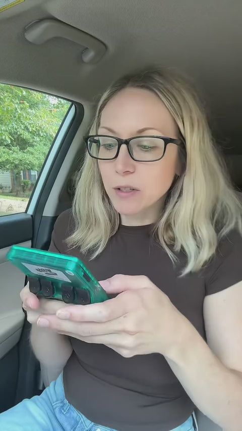 Handheld retro console being played